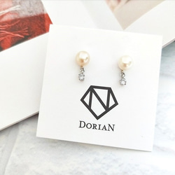DoriAN獨家設計銀飾品牌 淡水珍珠 方鑽 純銀耳環 前後配戴式 耳針 附保證卡禮物包裝拭銀布組合 珍珠耳環 可抗過敏 第1張的照片
