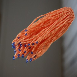 ふわふわしっぽのピアスorイヤリング(オレンジ) 2枚目の画像