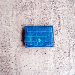 ライトブルー藍絞り革財布小さな袋が収納されました 8枚目の画像