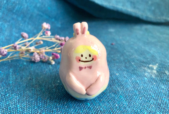 粉色兔小孩小花瓶 第2張的照片