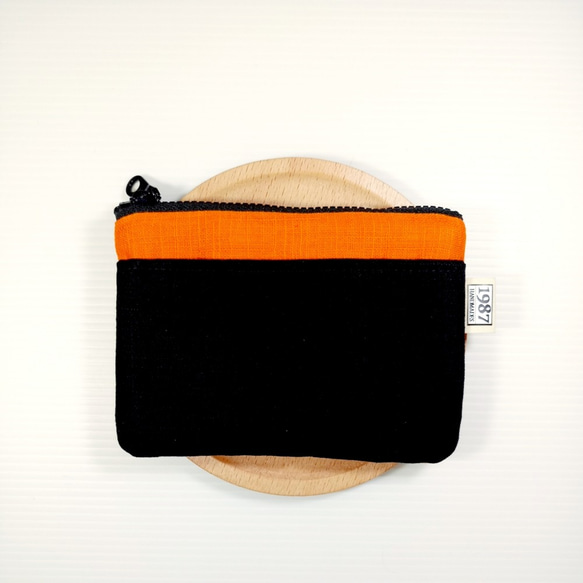 【撞色系列-橙與黑】零錢包 手拿包 隨身包 拉鏈袋 第1張的照片