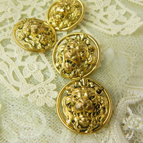 フランス、アンティーク・ライオンの真鍮ボタン ボタン キャラメル