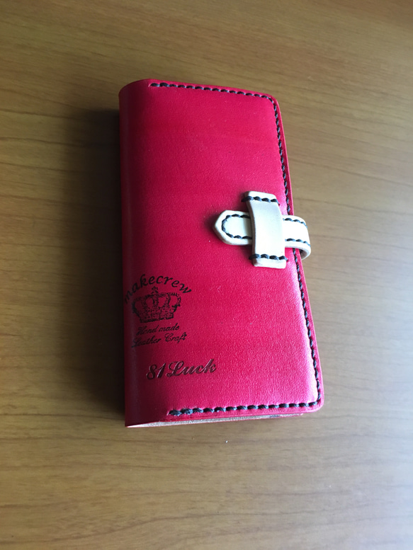 赤色夕焼けアンティークスマホカバーiPhone8 plus クリームストラップ 1枚目の画像