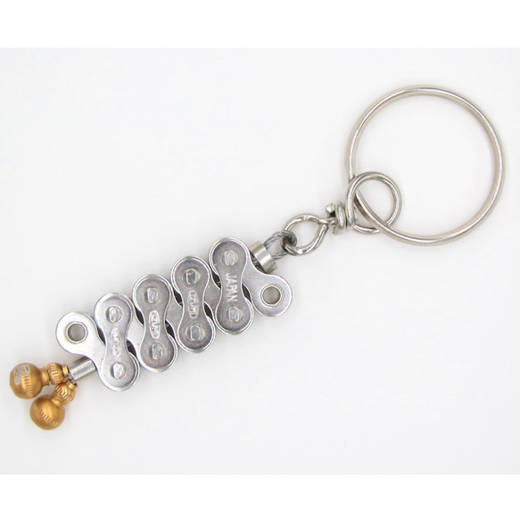 Bike Chain Keychain with calabash brake wire end-cap gold 第1張的照片