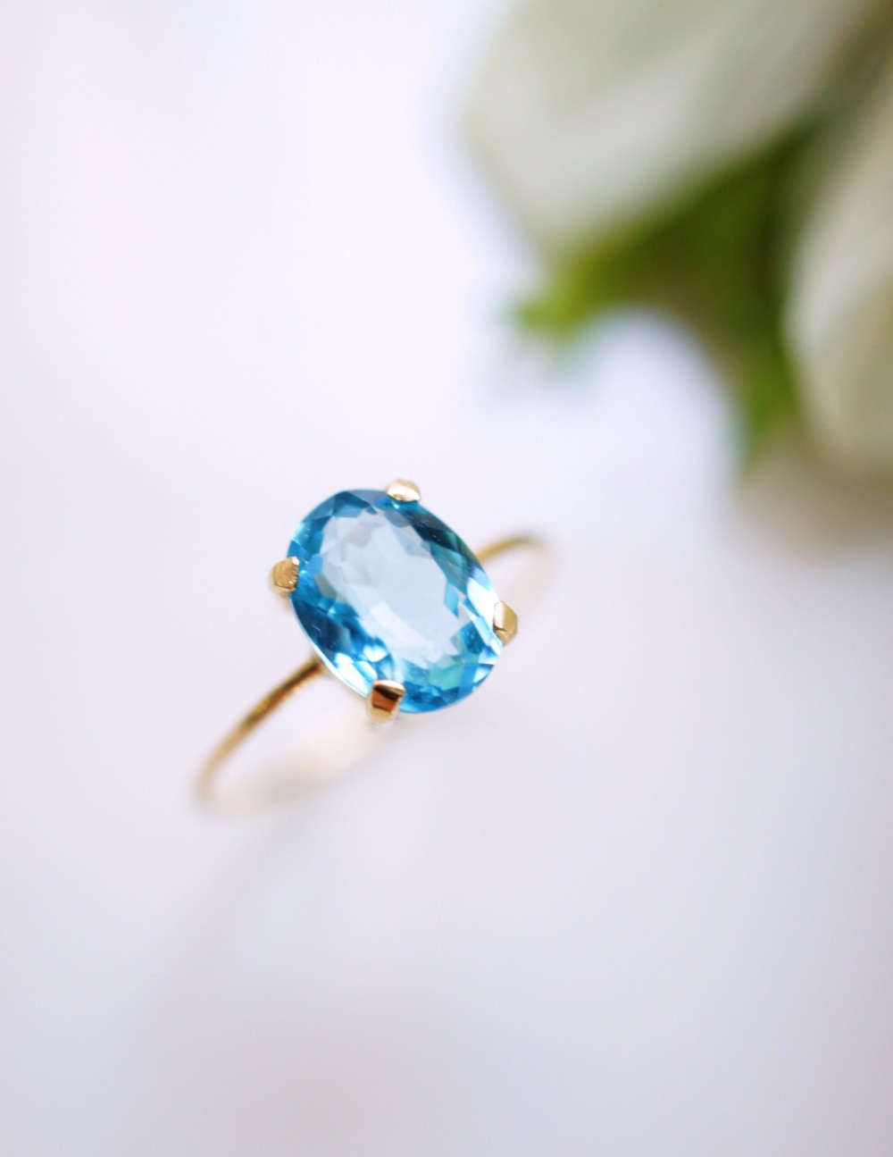 K18スイスブルートパーズのオーバルカット爪留めリング　～Morgan