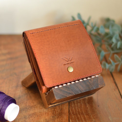 “精緻的錶殼，配以精美的硬幣盒”牛皮製成的折疊錢包和駱駝 第1張的照片