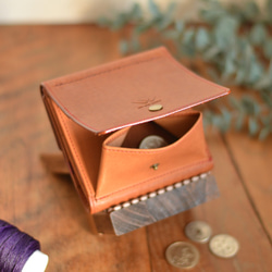 “精緻的錶殼，配以精美的硬幣盒”牛皮製成的折疊錢包和駱駝 第4張的照片