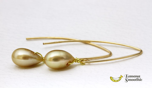 耳元から輝きを シャンパンゴールド 淡水パール 14kgf Vシェイプピアス 1枚目の画像