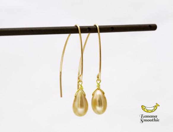 耳元から輝きを シャンパンゴールド 淡水パール 14kgf Vシェイプピアス 2枚目の画像