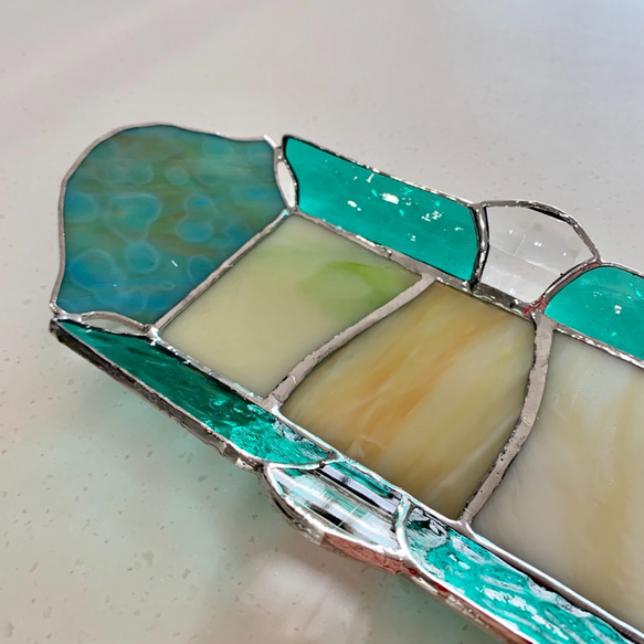 珠寶首飾托盤藍綠色灣景 第4張的照片