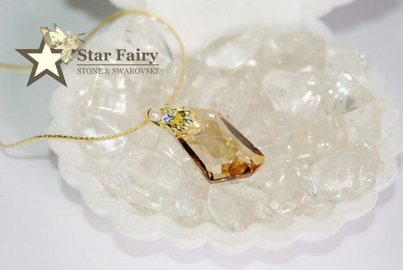 SWAROVSKI ゴールデンシャドーネックレス 1枚目の画像