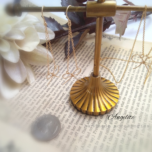 送料無料 14kgf リボンモチーフのネックレス ネックレス・ペンダント  