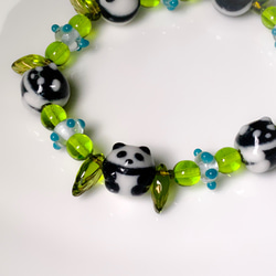 熊貓石熊貓瑪雅和綠色手鍊 第4張的照片