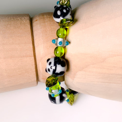 熊貓石熊貓瑪雅和綠色手鍊 第5張的照片