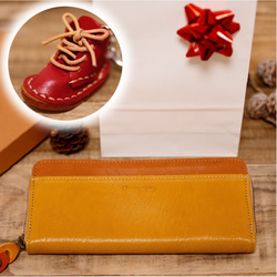 一生に一度令和の初クリスマスに贈る令和ゆかりの奈良財布　バイカラーのヌメ革財布 イエロー/オレンジ 1枚目の画像