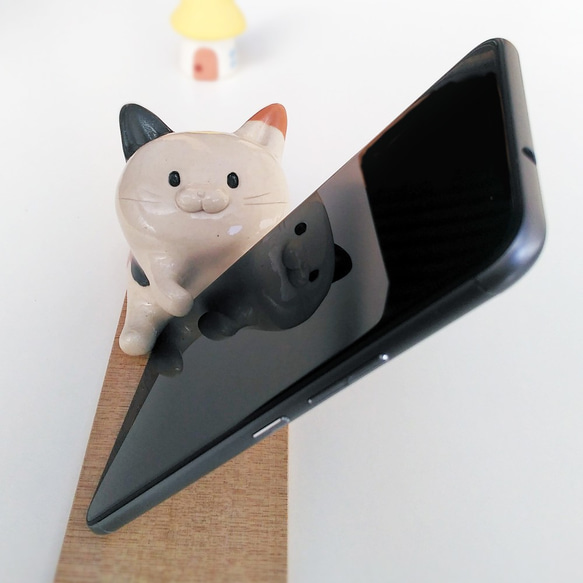 玳瑁的智能手機持有人nyanko智能手機站立貓 第3張的照片