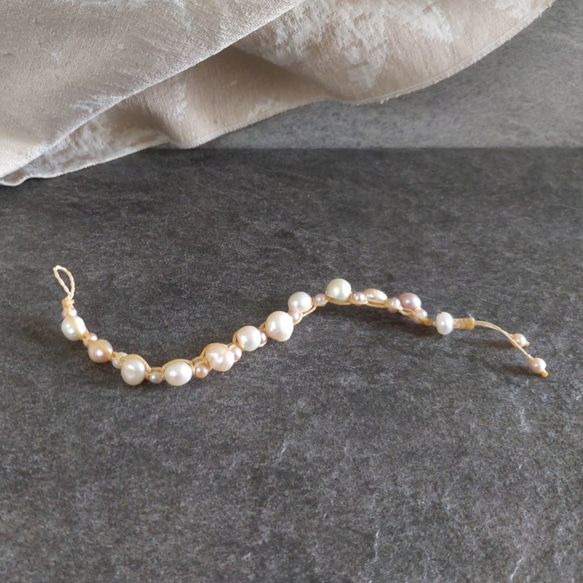 串鍊-[纍纍].微瑕隨形大小珍珠.南美蠟線繩編雙排手鍊 第2張的照片