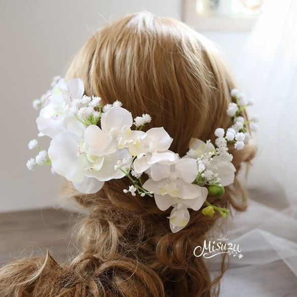 *misuzu*　胡蝶蘭とカスミソウの髪飾り　成人式　和婚　結婚式　２次会　ヘッドドレス 1枚目の画像