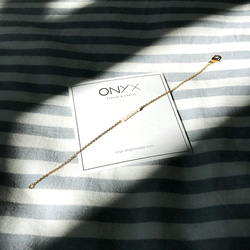 ONYX 超精緻2mm天然石 手鏈－月光貝 第3張的照片