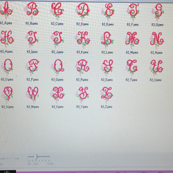 リネンの選べるお花のイニシャル刺繍巾着ポーチ　　 大　花花 4枚目の画像