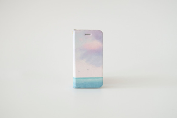 エメラルドブルー色の海と空の、手帳型スマホケース｜iPhone・Android 1枚目の画像