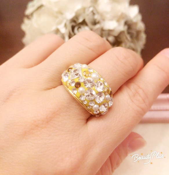 スワロフスキーリング 大ぶり マスタード色ベース 13号 指輪・リング J