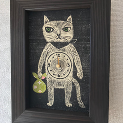 おさのなおこ　木版画　杉　猫の腹時計　掛け時計　置き時計 木版画の時計『腹時計』（風呂敷/花柄） 掛け時計・置き時計 おさの