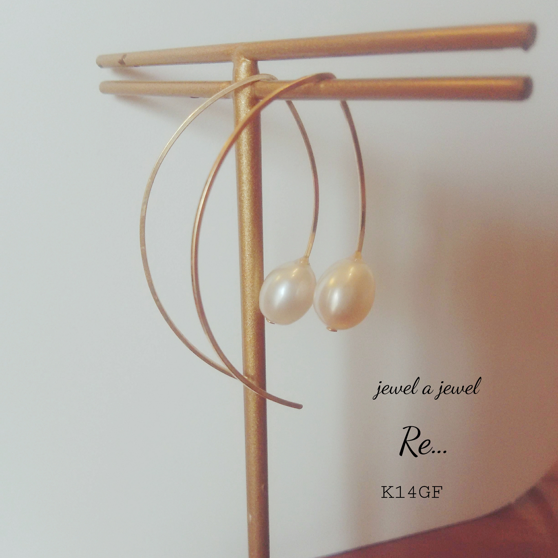 8mmオーバルパール14kgf アーチフックピアス