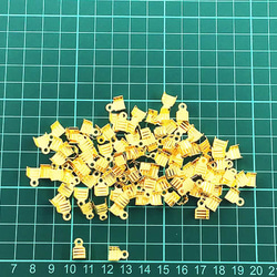 送料無料　紐止め金具　カシメ　ゴールド　100個　幅7mm　エンドパーツ　留め金具　アクセサリー　パーツ　AP0843 6枚目の画像