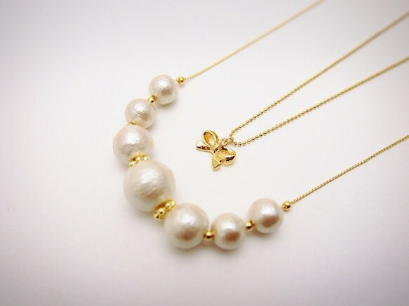 Ribbon & Kisuka cotton pearl necklace 第1張的照片