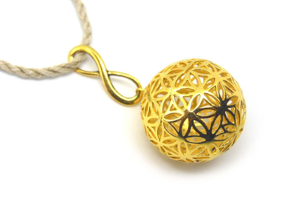 フラワーオブライフ 球状（籠目）・メビウスの輪　ヘンプ ネックレス（金色）（生命の花/神聖幾何学） 1枚目の画像