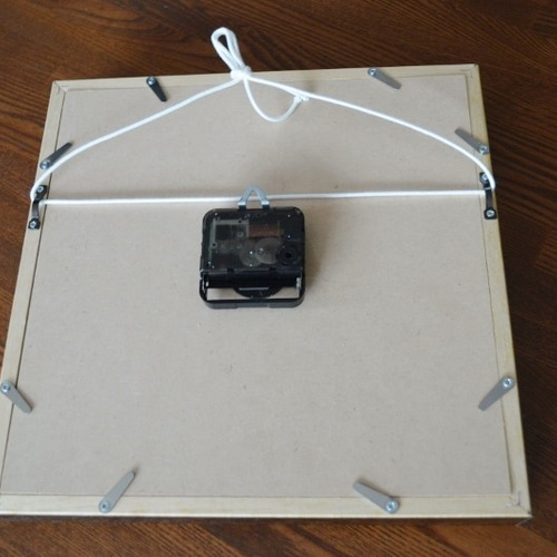 革の壁掛時計 フラワーカービング イタリアンレザー 掛け時計