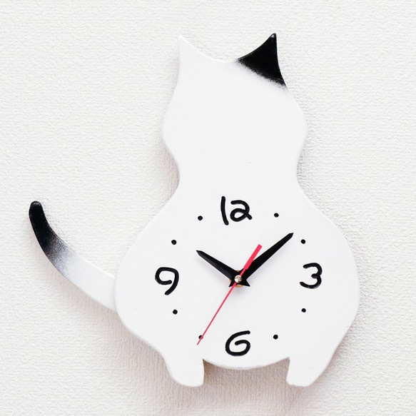 白猫の掛け時計　 1枚目の画像
