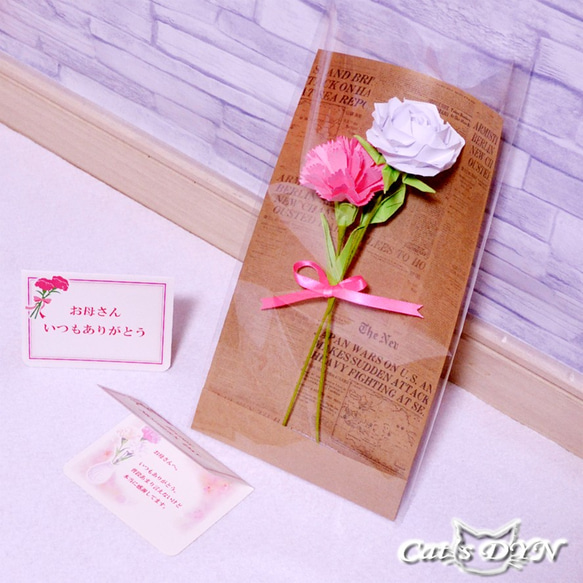 ピンクのカーネーションと薔薇の花（折り紙の薔薇の花） 1枚目の画像