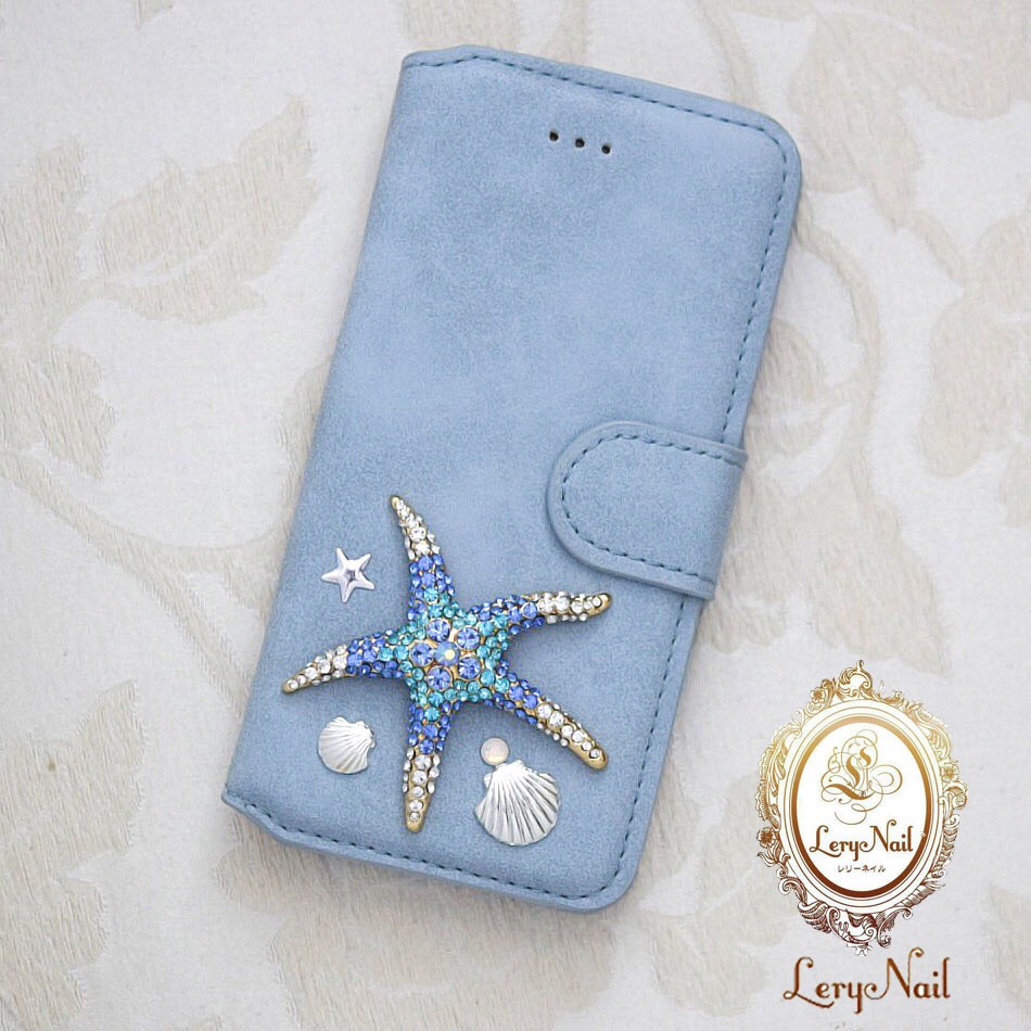 iPhoneXs対応【 iPhone】煌めくブルービジューBIGスターフィッシュ&シェル☆ブルーグレースエード調手帳型