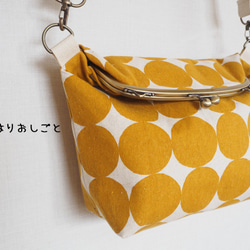 圓形圖案«Mustard»是一款maguchi 2way肩背包 第1張的照片