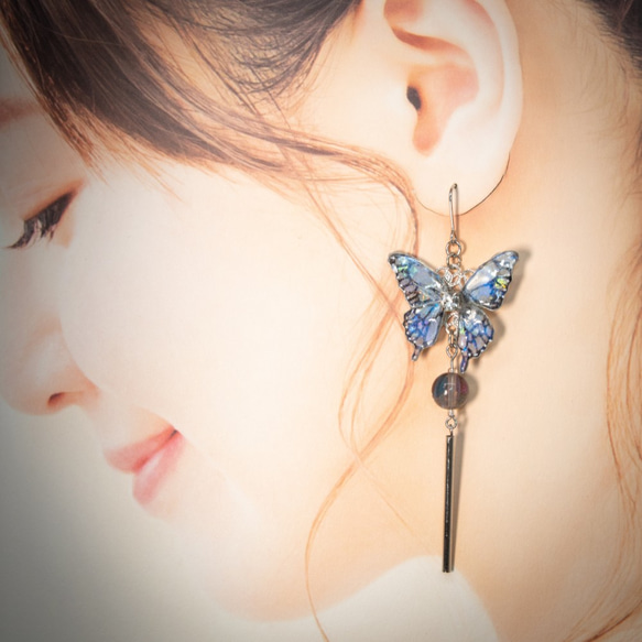藍色手工金屬線蝴蝶耳環 第4張的照片