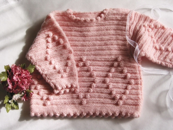 ベビー ピンクのセーター 1枚目の画像