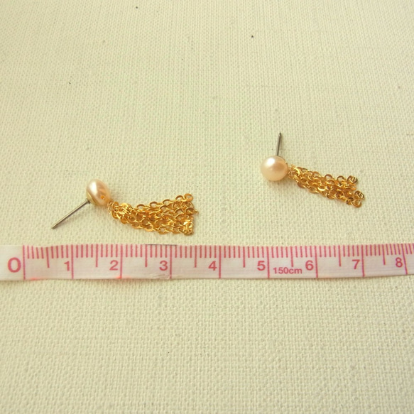 淡水珍珠及流蘇的插式耳環 第4張的照片