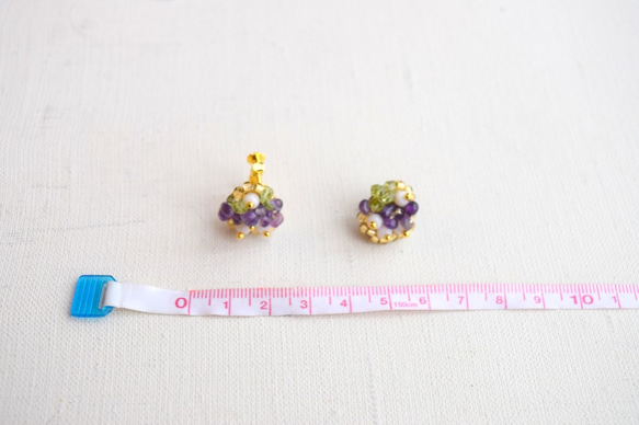 紫晶以及橄欖石的鈕扣夾式耳環   也可變更為鈦製插式耳環 第4張的照片