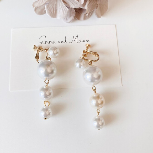 鈦柱純白色婚禮婚禮婚禮珍珠粒紋長珍珠耳環 第3張的照片