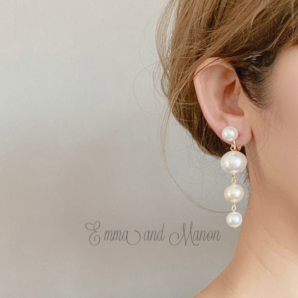 鈦柱純白色婚禮婚禮婚禮珍珠粒紋長珍珠耳環 第4張的照片