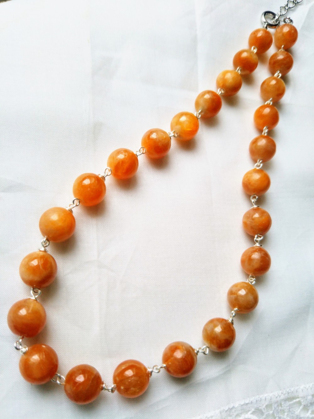 オレンジカルサイトネックレス
