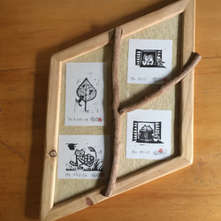 ミニ木版画「連作 ねこ暮らし」　和紙に手刷り、額縁とのセット販売。ユーカリの枝で三つに仕切った菱形の額縁　一点物です 1枚目の画像