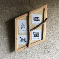 ミニ木版画「連作 ねこ暮らし」　和紙に手刷り、額縁とのセット販売。ユーカリの枝で三つに仕切った菱形の額縁　一点物です 2枚目の画像