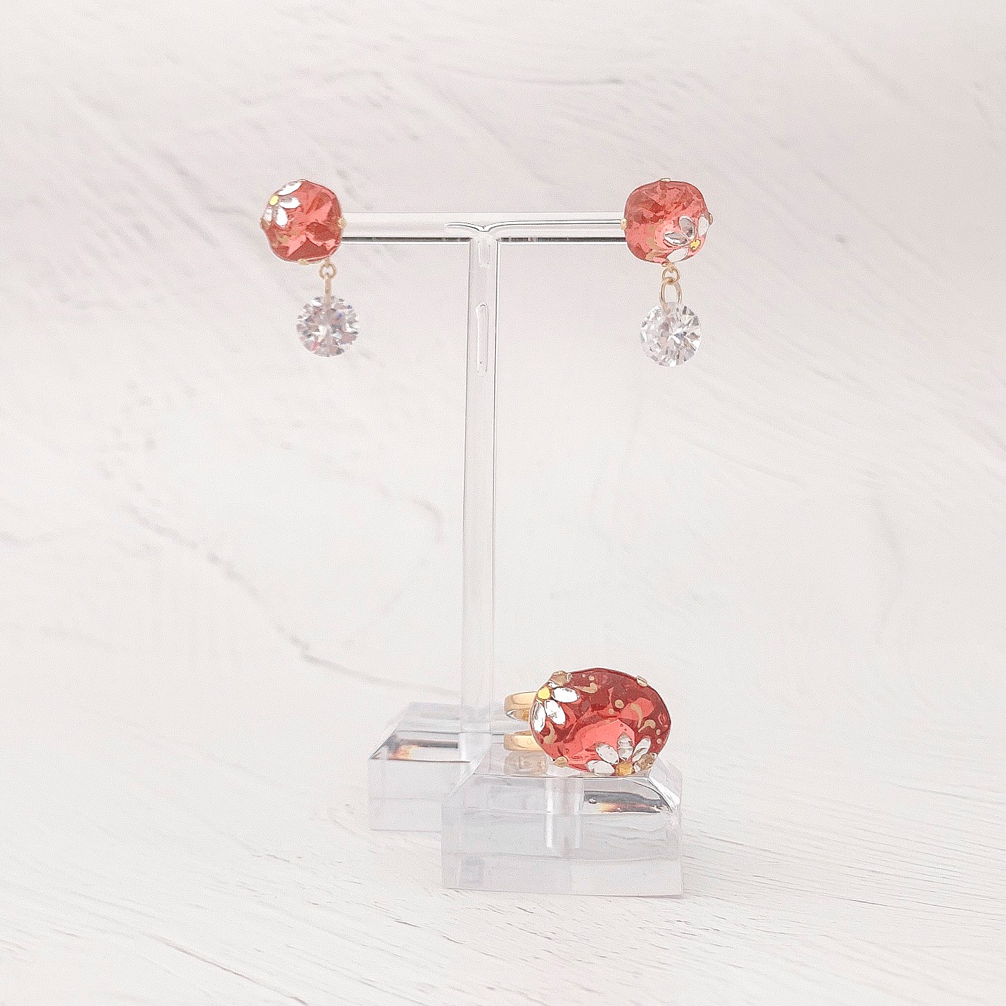 クリスタルフラワーピアス／オレンジ