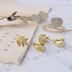 Reve 黃銅耳環 鋯石 水晶珍珠 施華洛世奇 樹葉 葉子 花 花苞 第1張的照片