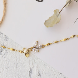 Reve 黃銅手鍊 鋯石 淡水珍珠 花 葉子 蝴蝶 翅膀 第2張的照片