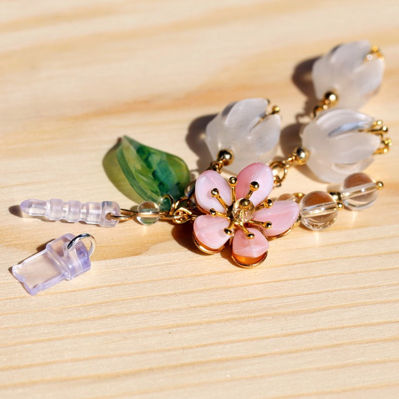 [インク]・小型新鮮な桃の天然白クリスタルガラスベル蘭iphone携帯電話のストラップのダストプラグのストリームの花の鐘カン・フ 3枚目の画像