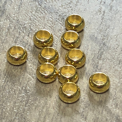 ゴールドカラー 金属 大穴 ビーズ 5mm径 10個セット 1枚目の画像